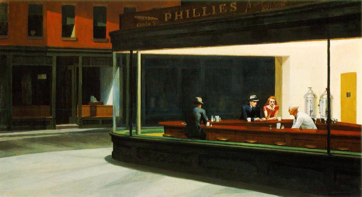 imagem da obra que inspira a reflexão: «Nighthawks», de Edward Hopper. A obra retrata um restaurante iluminado durante a noite, visto da rua vazia. No interior, três pessoas estão sentadas ao balcão: um empregado de branco e dois clientes, um homem de chapéu escuro e uma mulher de vestido vermelho. O contraste entre o interior luminoso e a rua escura transmite uma sensação de silêncio e solidão urbana.